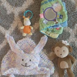 Lot of 4 plush toys - Car seat piglet, tag book, plush rabbit lovie and monkey rattle