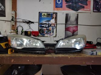 OEM. Front Headlights Ford Escape 2013-2016