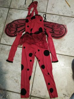 Lady bug child Medium (7-8).. Top, pants, headband, arm sleeves and wings.