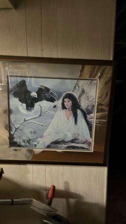 framed print is "Spirits Soar" by artist Maija, depicting a Native American woman alongside a bald eagle.