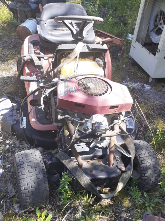 Lawn mower as is (might run or parts)