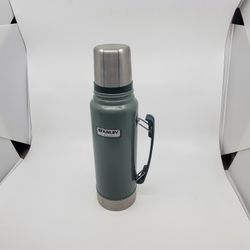 Stanley Heritage Classic Vacuum Bottle with Handle 1.1 qt Hammertone 
Green. New, never been used, still with tag, but  It is some scuffs on 
the bott