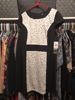 Kenzie brand dress. Black white and dots XL. No stretch dress with zipper back. The dots are different sizes more like spots.