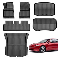 Tesla floor mats  BARELY USED COMPLETE SET