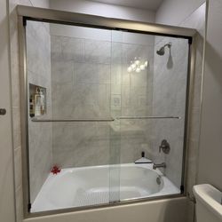 Sliding tub doors