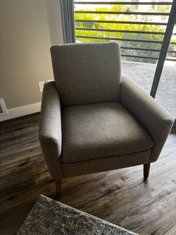 Two Mid-Century Modern Tan Fabric Armchairs