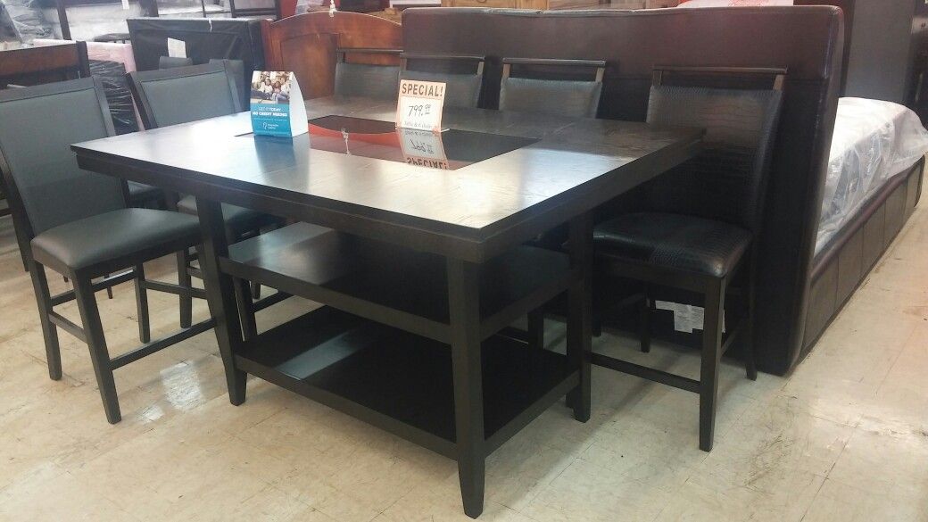 Table with 6 chairs at "4-U-2 Furniture"