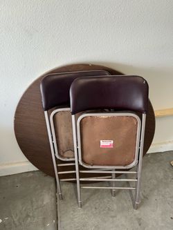 Round. Fold up table with chairs.