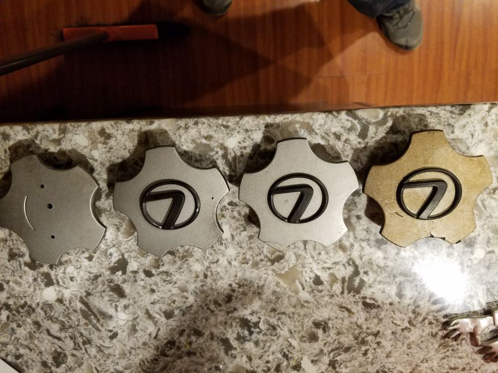 Lexus is300 center caps