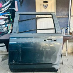 CADILAC ESCALADE 2021-2023 lEFT DRIVER SIDE REAR DOOR OEM 