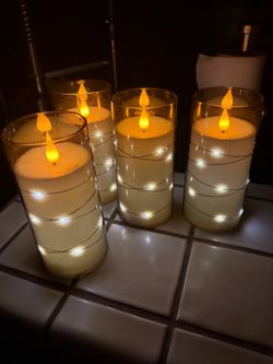 Set of 4 flickering LED candles (6 in tall)