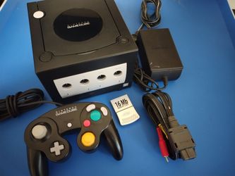 Nintendo GameCube console with controller and cords