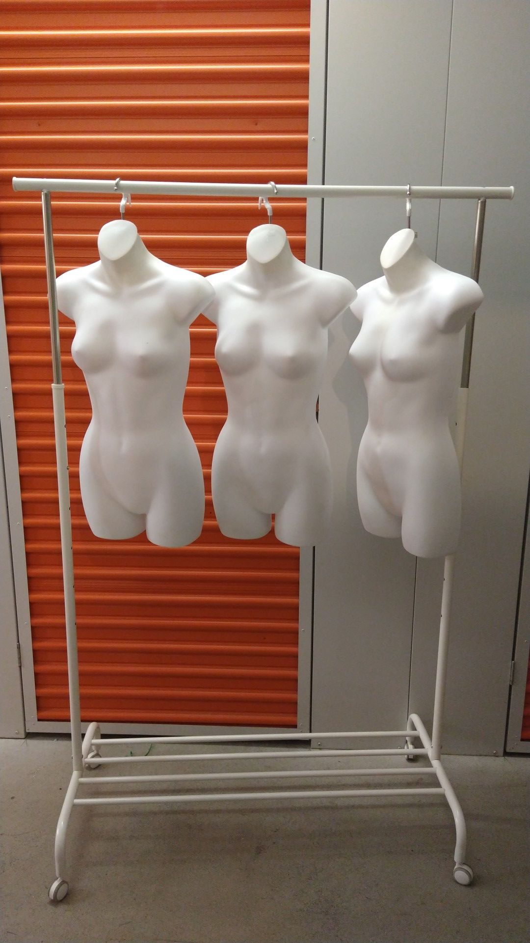 Adjustable clothing rack and hanging mannequin displays