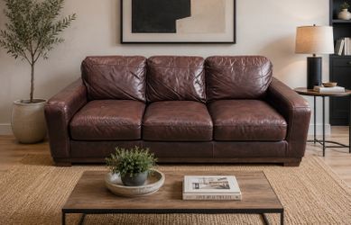 Real leather couch - can deliver within 35 miles with non refundable deposit.