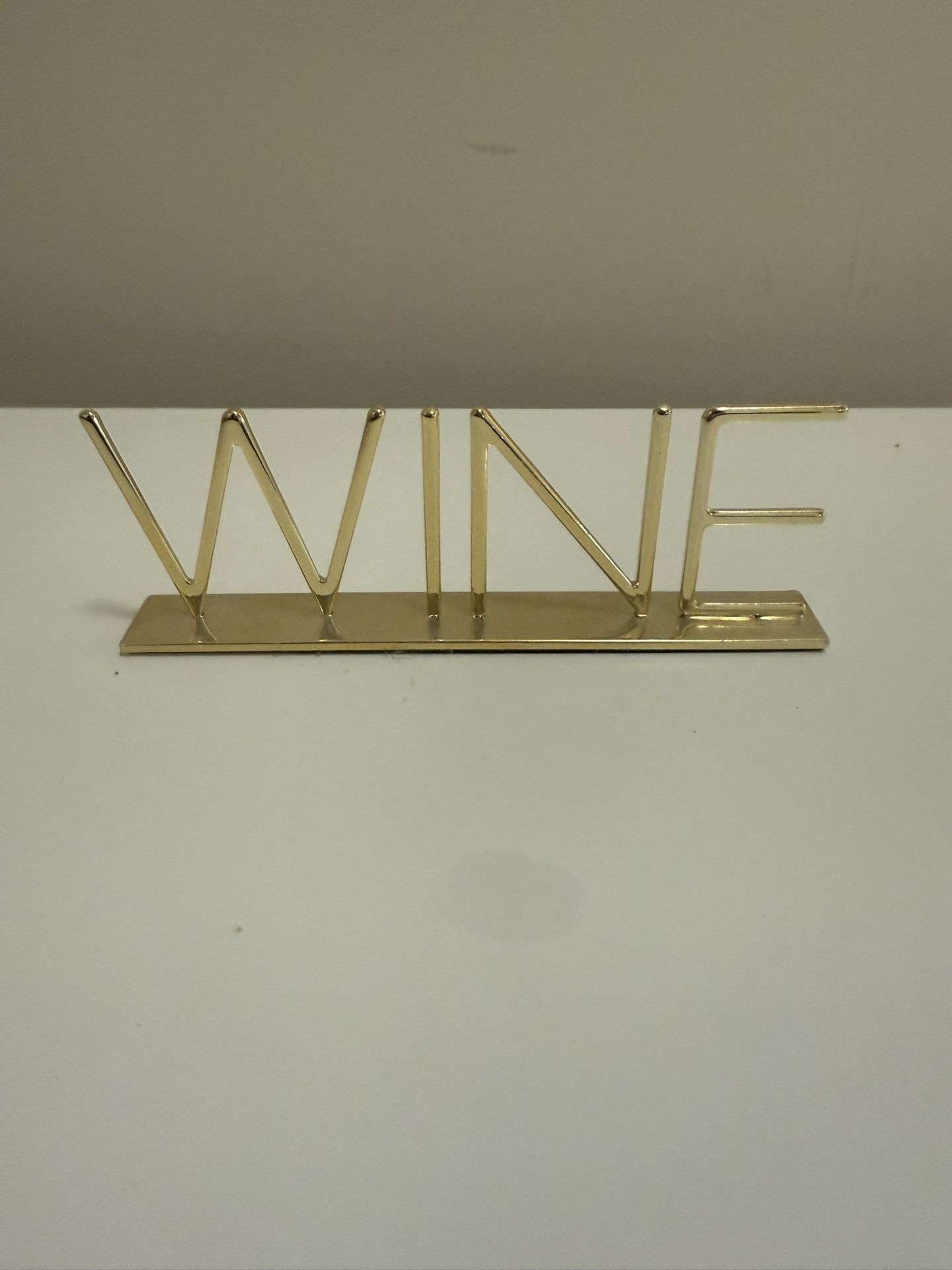 Decorative Gold “WINE” Sign