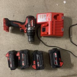Milwaukee hammer drill And batteries