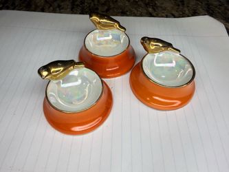 This is a set of vintage ceramic salt cellars (also known as salt dips)