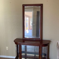 curio cabinet with mirror