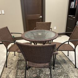 Wicker/Glass Table and 4 chairs