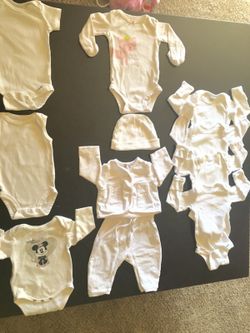 White onesie and full suit with cap