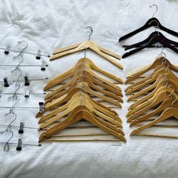 32 wooden and metal clothing hangers
