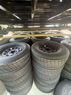 Brand. New 205/75R15 Tire on 5-Lug Rim