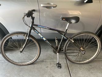 GT All Terra Outpost Trail 21-speed mountain bike with the iconic Triple Triangle frame and a Trek 4300 21 speed mountain bike