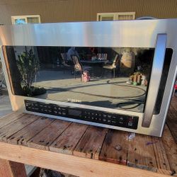 Samsung 2.1 cu. ft. Over-the-Range Microwave in Stainless Steel.