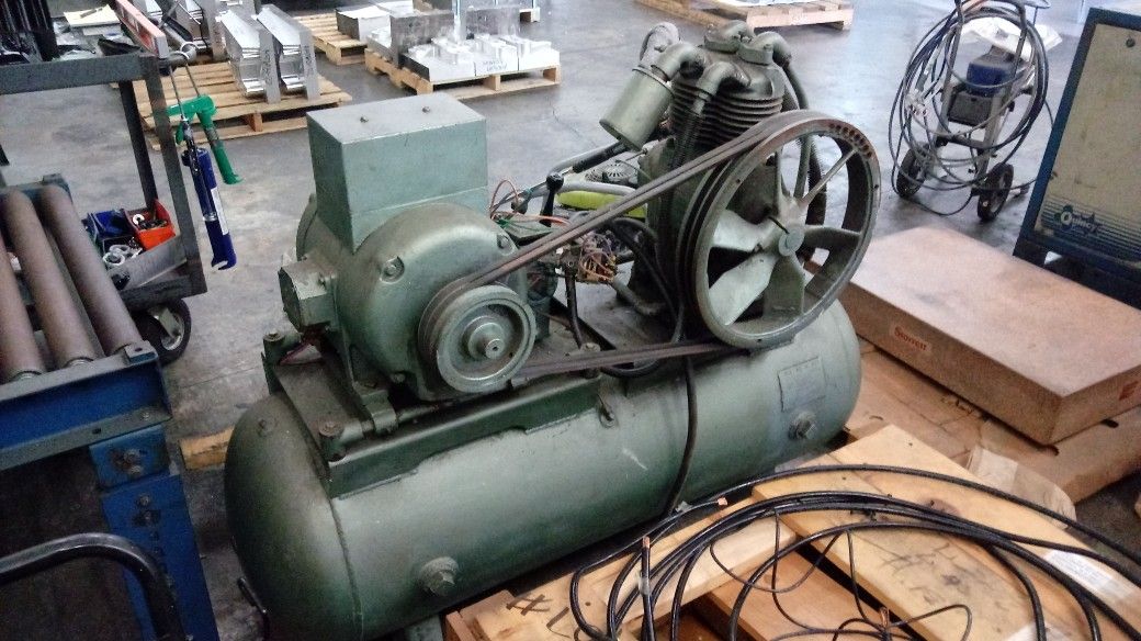 Huge old vintage air compressor