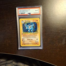 1999 Pokémon 1st Edition -  MACHAMP  -  PSA 8 Holo