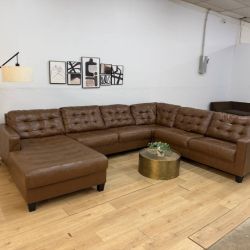 Genuine Leather 4-Piece Sectional Couch by Ashley
