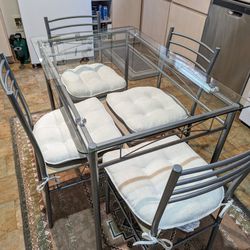 Glass Table & Chair Set: Farewell, Tiny Apartment Pal! ($180)