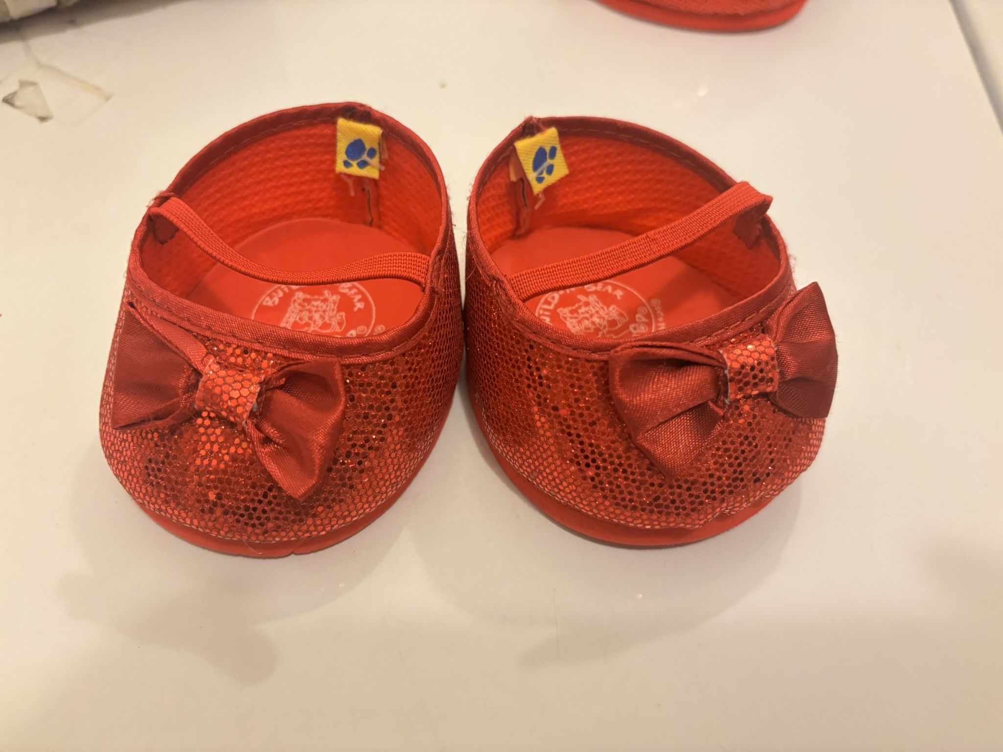 Build a Bear red sparkling shoes.