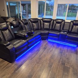 Gourges Sectional Black Faux Leather W/ LeD Light, Wireless Charger, Cup Holder & Storage Console 2 Power Recliners $1599 Add Chair $399