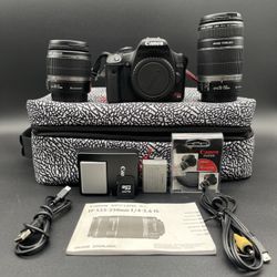 Canon EOS Rebel DSLR 15.1 MP Camera with 3-Inch LCD, Lens, And Carry Case
