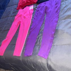 Two pairs of Leggings a Blouse and a T- shirt