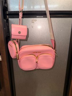Pink Michael Kors crossbody bag