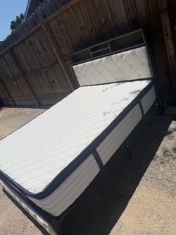 Queen bed frame with mattress in great condition
