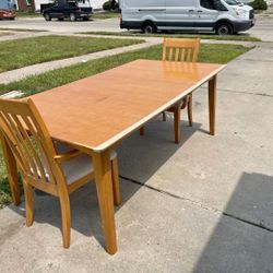 Dining room table with 2 chair.