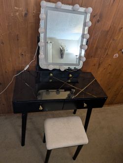 Vanity With Lighted Mirror And Drawers