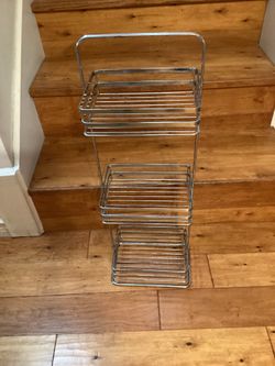 3- Shelves Metal Shelf. Dimensions are; 29”H—9”W—6-1/2”D.