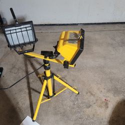 dual halogen work light with a tripod stand. 