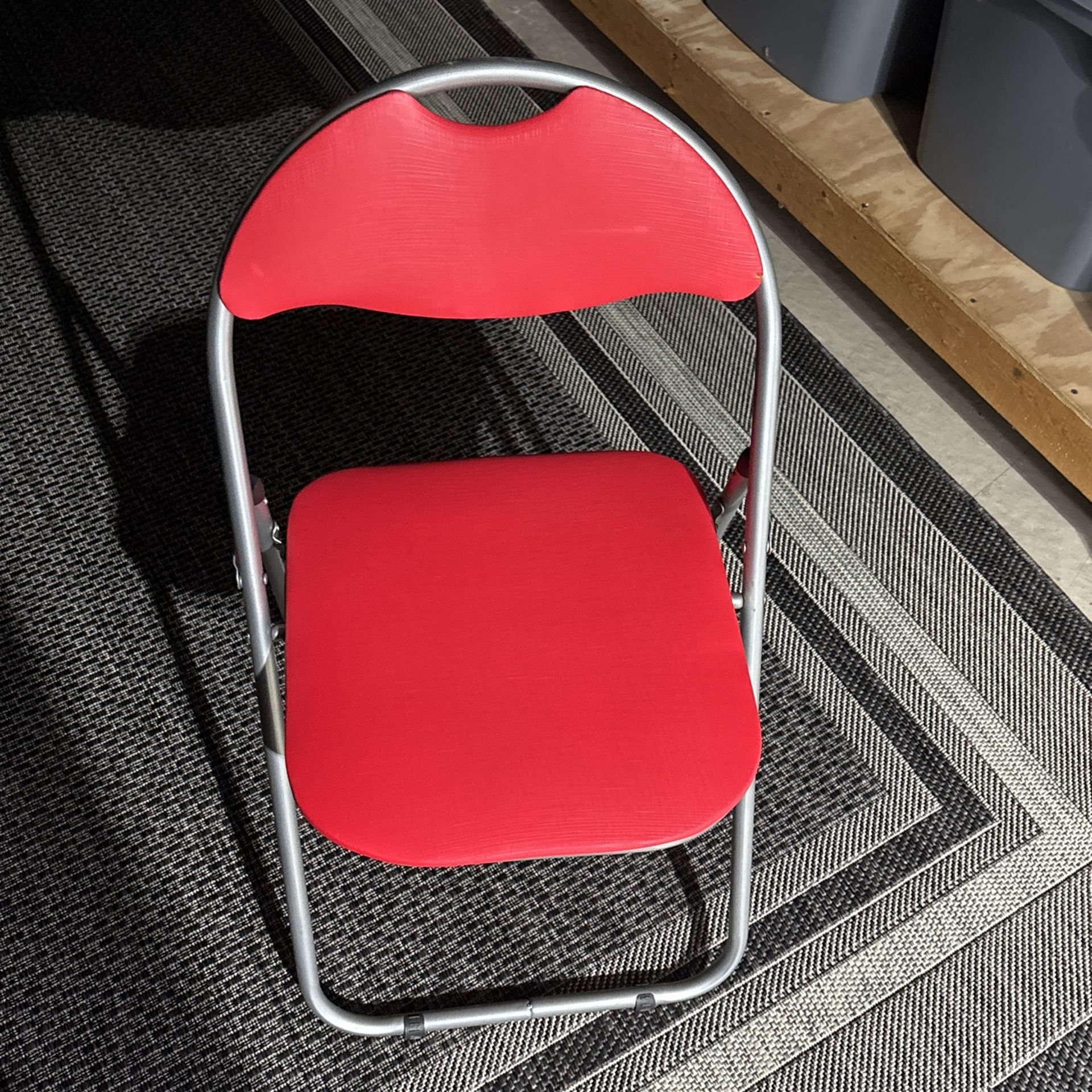 8 Brand New Folding Chairs