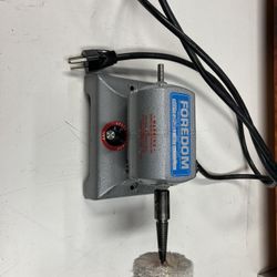 Foredom bench motor / flex shaft tool. Variable speed control built into base.  Includes:  * Motor unit * Attached polishing wheel (as shown)  Works w