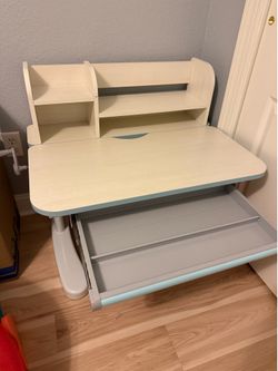 Kids desk with hutch .. stands up excellent condition