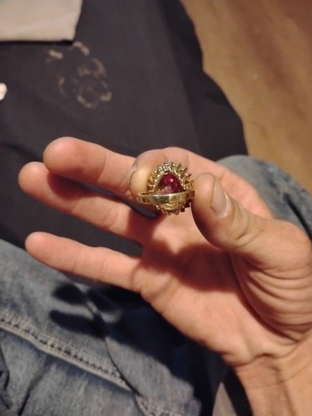 18 Karat Gold Ruby Oval Shape Diamond Ring