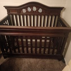 Wooden Baby crib Has Everything 