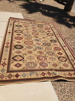 10 ft 10 in by 7 ft 10 in rugs