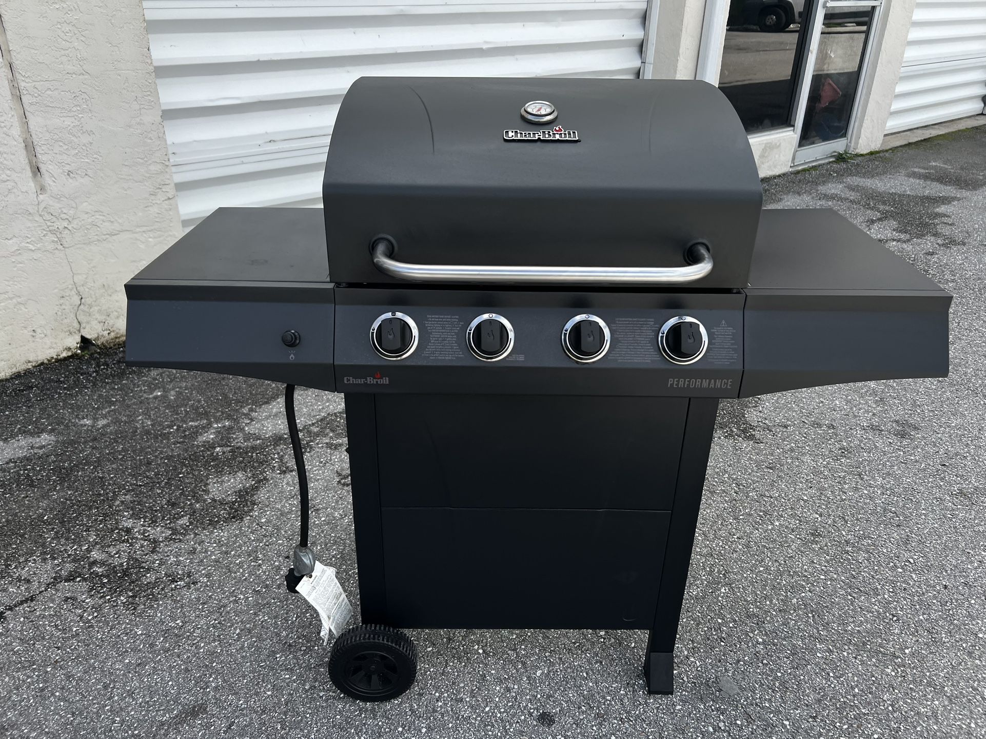 Delivery Available! Char-Broil Performance Black Steel 4 Burner Propane Gas Grill BBQ! Works great! Has to be lit using a lighter. Does not include pr