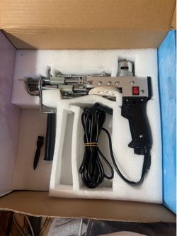 Tufting gun